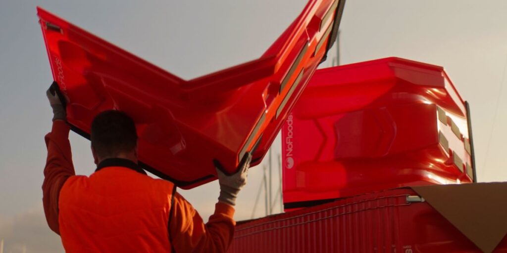 Personnel Carrying the EasyWall water diversion flood barrier